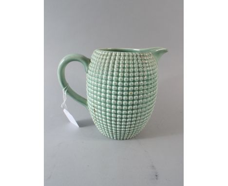 A Clarice Cliff Pineapple Jug by Newport Pottery (AF) 