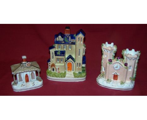 A Staffordshire Pottery Pastille Burner in the form of a gabled house with blue glazed roof, 6 1/2" (17cms) high, another in 