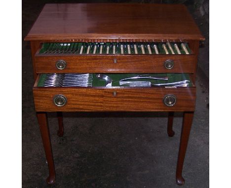 A mahogany two drawer Cutlery Table and Contents of Walker & Hall plated cutlery for twelve covers including bone handled kni