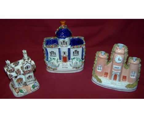 A Staffordshire Pottery Model of a castle entrance with clock tower inscribed "1847", 6" (15cms) high; a Staffordshire Model 