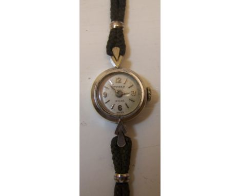 A ladies Eterna Wristwatch with circular dial, the case marked '14k gold'.