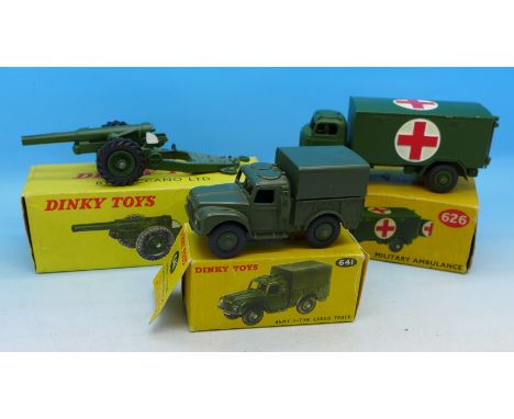 Three Dinky Toys, 626 Military Ambulance, 641 Army 1-Ton Cargo Truck and 693 7.2 Howitzer, all boxed