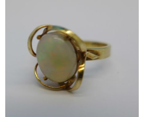 A 9ct gold and opal ring, opal 11mm x 8mm, 3.2g, O