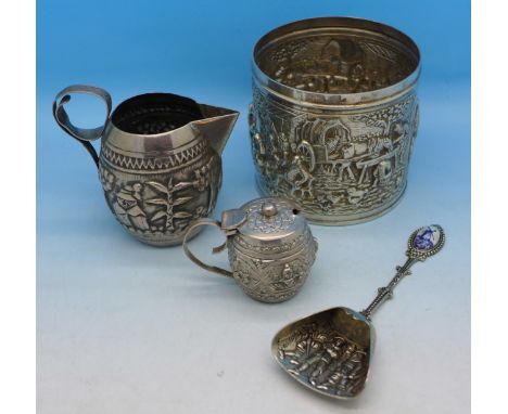 Two white metal jugs, a container and a caddy spoon