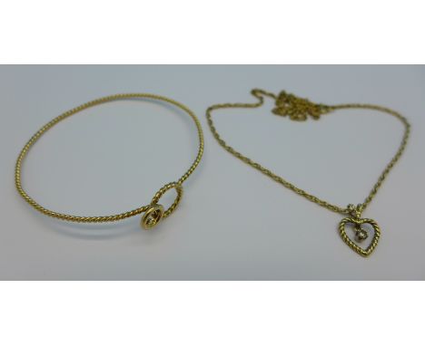 A yellow metal bangle and a similar heart shaped pendant on a 9ct gold chain, both set with diamonds, total weight 8.1g