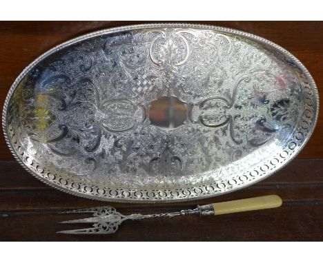 A silver plated on copper tray and a toasting fork with silver ferrule