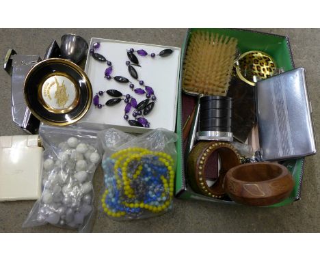Fashion jewellery, an Art Deco brush, compacts, trophy, bangle, etc.