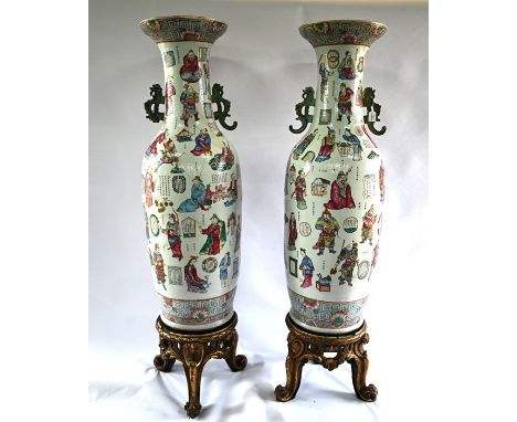 A very large pair of 19th century Chinese famille rose 'Wu Shuang Pu' baluster vases, Qing dynasty, each vase with two applie