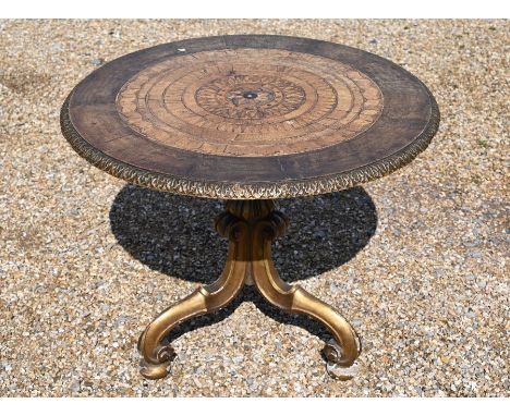 An antique Maltese tripod table, the circular parquetry veneered top raised on a giltwood base (reduced in height) 78 cm dia.