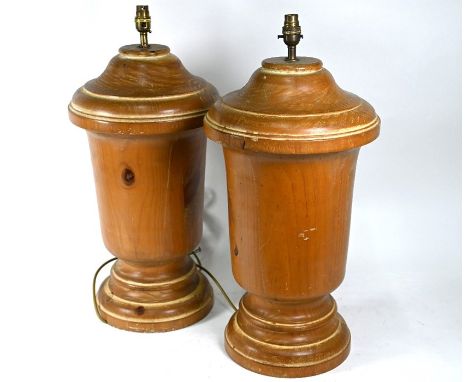 A large pair of turned pine table lamp bases, approx. 32 cm dia. x 56 cm h (excluding fittings and shade) (2)Chips to vestigi