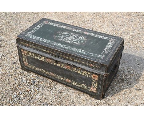 A Chinese green leather and brass clad camphorwood trunk, hand decorated with floral designs, 91 cm x 46 cm x 40 cm hsound st