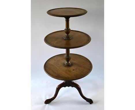 A Victorian mahogany dumb waiter, the three circular graduated tiers raised on a tripod base, max. 60 cm dia. x 114 cm h