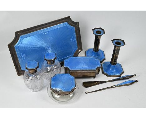 A fine quality silver, parcel gilt and blue guilloche enamel dressing table set, comprising tray 31 x 21cm, trinket box 15cm 