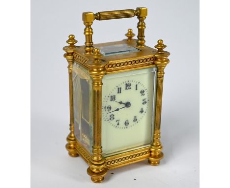 A miniature brass cased aesthetic style carriage clock, 9 cm h o/all (one side window cracked) a/f