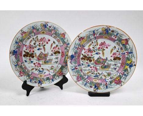 A pair of 18th century Chinese export famille rose plates, Yongzheng/Qianlong period, Qing dynasty, each plate is finely pain