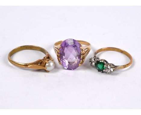 An oval amethyst dress ring in high claw 9ct yellow gold setting, size P, amethyst approx 1.5 x 1 cm;&nbsp; 9ct yellow gold r