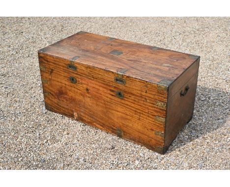 A 19th century brass bound camphor wood campaign trunk, 112 cm w x 56 cm x 54 cm h&nbsp;well used, surface displaying a multi
