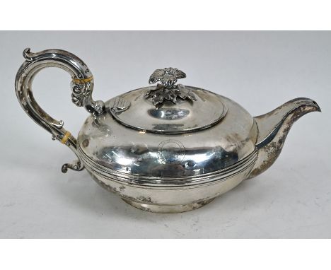 A William IV silver teapot of compressed melon form, with cast floral finial and scroll handle with ivory insulators, J.E. Te