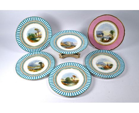 A Victorian china comport, painted with Continental river scene with fortress within turquoise reeded border, on scrolling ba