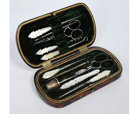 A Victorian Tartanware (Mauchline) necessaire, fitted with steel and mother-of-pearl tools and later silver thimble