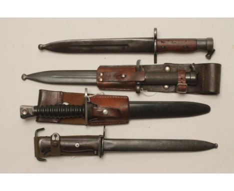 A NORWEGIAN M1 BAYONET, c.1956, with steel scabbard and canvas frog, together with a Swedish model 1896 bayonet, an Egyptian 