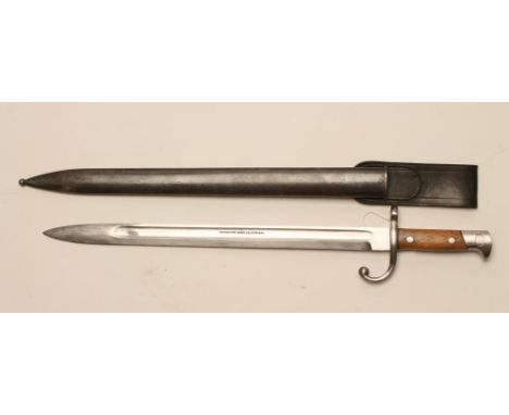 A US MODEL 1899 REMINGTON BAYONET, with 16" blade stamped "REMINGTON ARMS CO. ILION.N.Y.", steel hilt with two piece wood gri