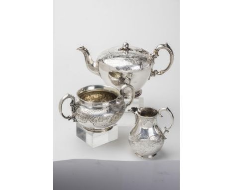 AN EARLY VICTORIAN SILVER THREE PIECE TEA SET, makers The Barnards, London 1841, of rounded cylindrical form, chased and engr