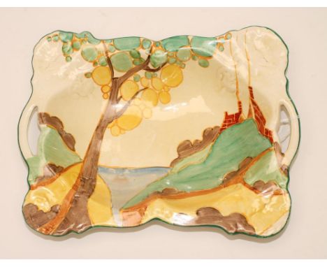 A CLARICE CLIFF NEWPORT POTTERY DISH, 1930's, of rounded oblong form with two integral handles and flower moulded angles, pai