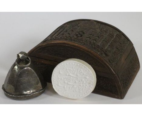 A LARGE INDIAN WHITE METAL SEAL, c.1870, the oval seal incise carved in script (translated as Charles Master, Zamidas .... Is