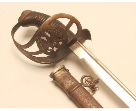 A GERMAN MODEL 1889 CAVALRY SWORD, with 32 1/2" pipe back blade, steel hilt with eagle cartouche, celluloid grip and metal sc