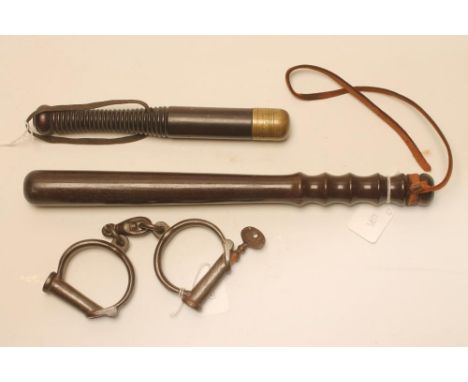 A VICTORIAN COSH, with finely turned handle and heavy brass tip inscribed "JOHN VINCE, CONSTABLE, GARFORTH.", together with a