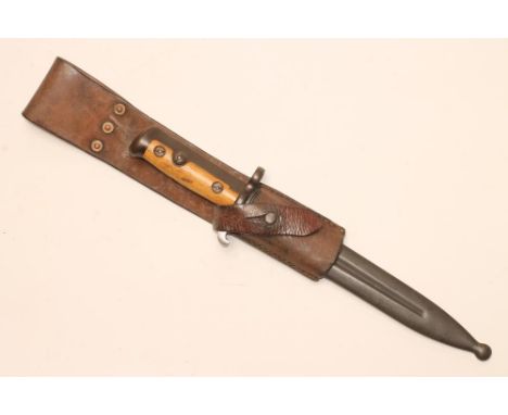 A RARE NORWEGIAN MODEL 1944 BAYONET, with 8 1/4" double edged blade stamped EAB and 3724, scabbard button release, two piece 