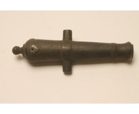 A SIGNAL CANNON, 19th century, with muzzle swell, simple trunnions, touch hole, vent and rear knob, 8 3/8" long   (Est. plus 