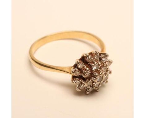 A DIAMOND CLUSTER RING, the nineteen small brilliant cut stones set to a plain 18ct gold shank, size M    (Est. plus 18% prem