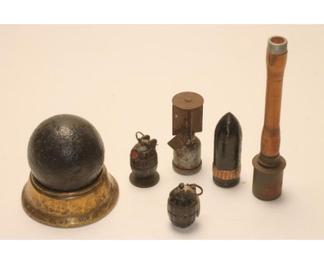 A COLLECTION OF WORLD WAR TWO EPHEMERA, comprising two British deactivated grenades, a deactivated German stick grenade, an a