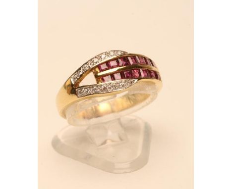 A RUBY AND DIAMOND RING, set with two lines of seven channel set square cut rubies with a forked band millegrain set with sma