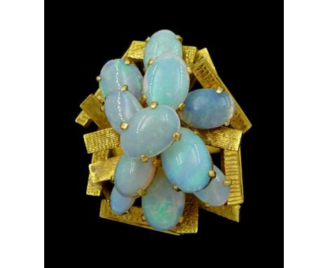 14ct gold opal cluster ring, stamped 585Condition Report:Approx 6.65gm, size L, head = 22mm x 20mm