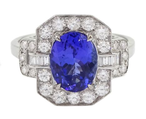 18ct gold oval tanzanite, round and baguette cut diamond cluster ring, stamped 750, tanzanite approx 1.85 carat, total diamon