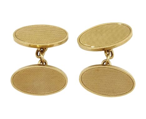 Pair of 9ct gold cufflinks, with engine turned decoration, Birmingham 1960Condition Report:Approx 14.75gm, the underside engr