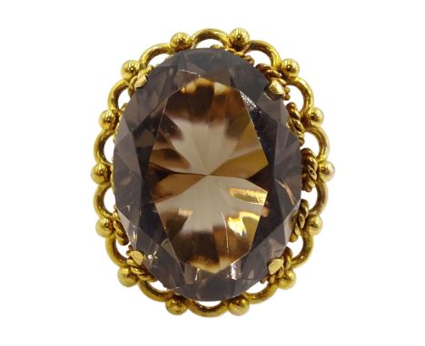 14ct gold single stone large oval smokey quartz ring, stampedCondition Report:Approx 14.75gm, tested 14ct, size J-K, head = 2