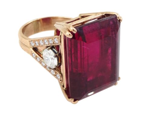 Rose gold rubellite tourmaline and diamond ring, the central octagonal step cut tourmaline of 43.25 carat, with a round brill