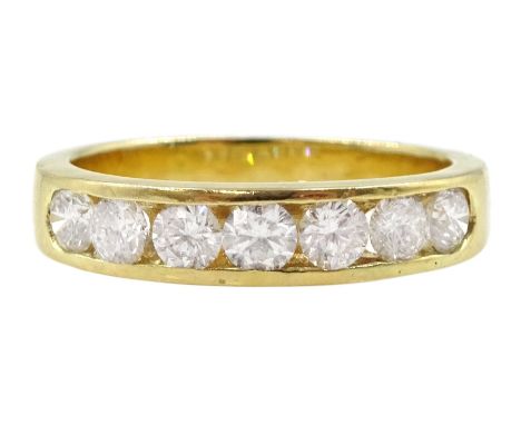 18ct gold channel set seven stone round brilliant cut diamond half eternity ring, stamped 750, total diamond 0.60Condition Re