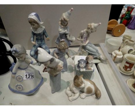 Mixed Lladro, Nao and other figurines, some with damages (8). Not available for in-house P&amp;P 