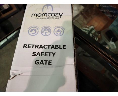 Momcozy retractable safety gate. Not available for in-house P&amp;P 