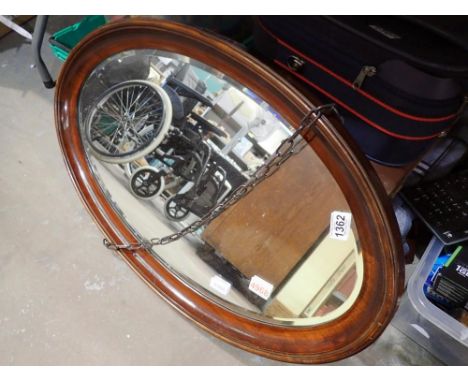 Oval mahogany framed bevelled edge mirror. Not available for in-house P&amp;P 