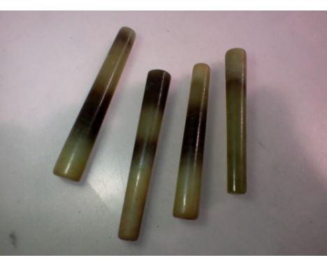 Four ancient turned jade columns, L: 60 mm. P&amp;P Group 1 (£14+VAT for the first lot and £1+VAT for subsequent lots) 