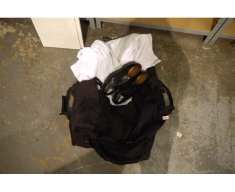 British army issue black kitbag/bergen containing Royal Navy white shirts, black pants and shoes. Not available for in-house 