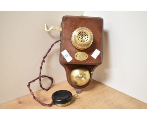 A vintage brass and mahogany wall mounted 'Weaving Shed' telephone transmitter/receiver