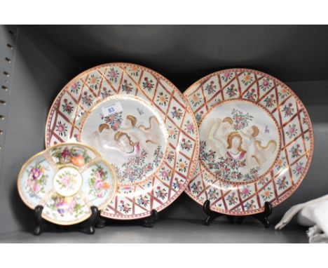 A Meissen porcelain lobed oval saucer dish, decorated with figural and floral vignettes, painted crossed swords mark to base 