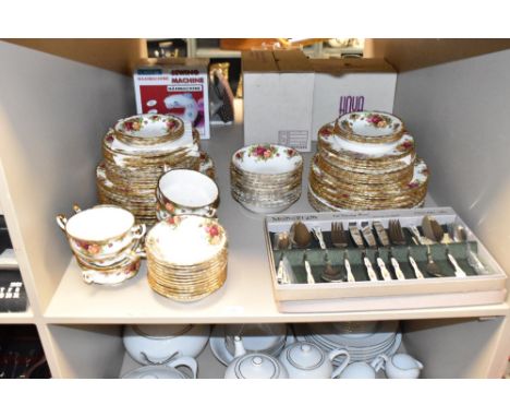 A Royal Albert Old Country Rose pattern part dinner service decorated with gilt edge and floral designs, comprising of 22 din